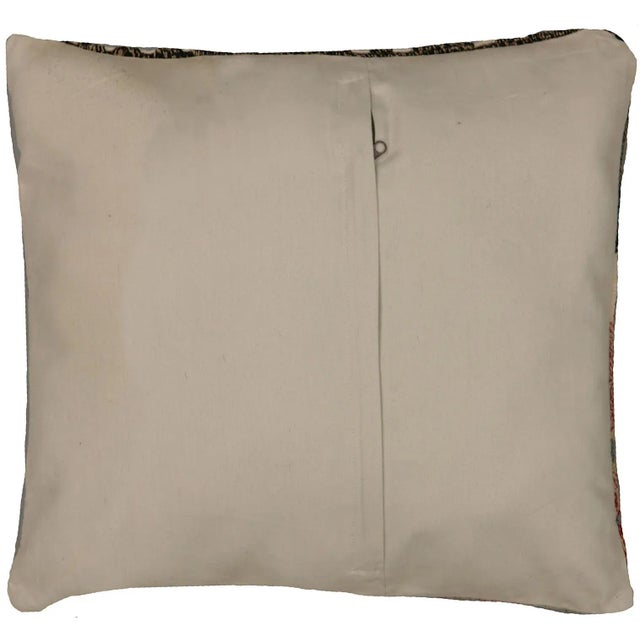 This pillow is made with a vintage handwoven Turkish hemp rug fragment. It has a cotton back and a zipper closure. Please...