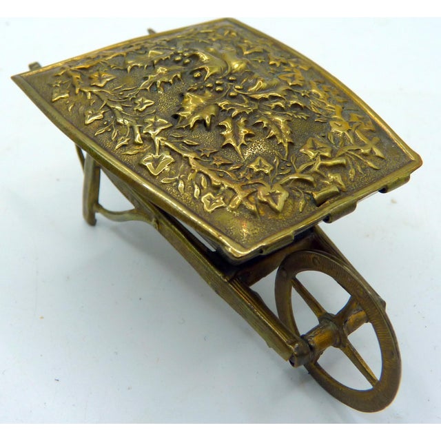 A quintessential miniature "mechanical marvel" of the Victorian era, this 4" curiosity figural needle case was produced by...