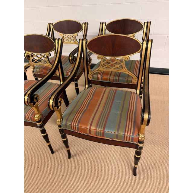 Fabulous set of Arm Chairs from John Widdicomb. Black Lacquer, Burled Wood and Guilt these hand carved beauties are...