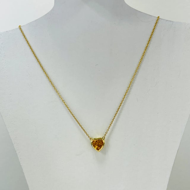 Beautiful 1.60 ct. citrine heart shape in a handmade 18k yellow gold bezel. Total length is 16.5".