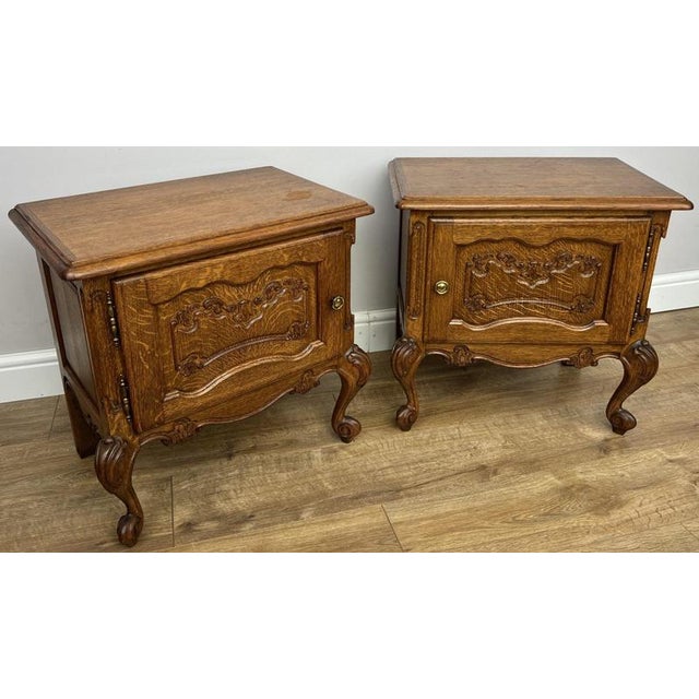 Add classic French elegance to your bedroom with this beautiful pair of Vintage French Louis bedside tables. Crafted from...