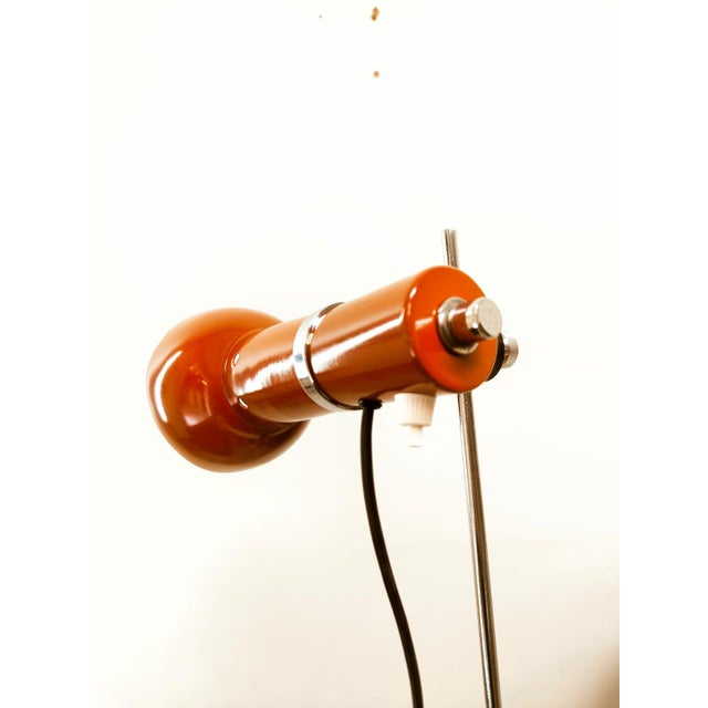 Clamp Light in Red Metal, in Very Good conditions. Designed 1960 to 1969 European Plug (up to 250V).The wiring of this...