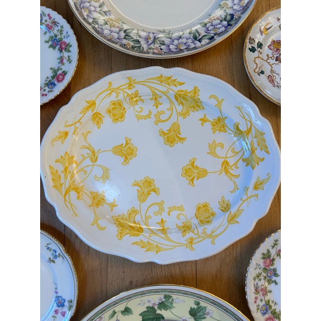 This is a beautiful collection of 9 floral plates to add to a plate wall or create one. The center oval plate is a...