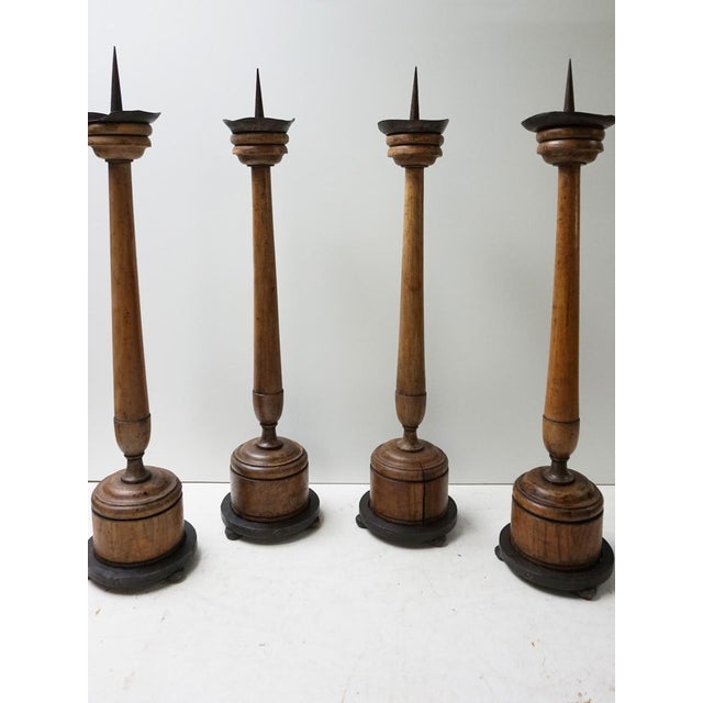 Set of 4 large antique French 19th century wooden candlesticks. This set of candlesticks are early 19th century and...