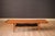 Mid century modern two-tier coffee table in teak designed by Poul Jensen for Selig, Denmark circa 1960's. The table top...