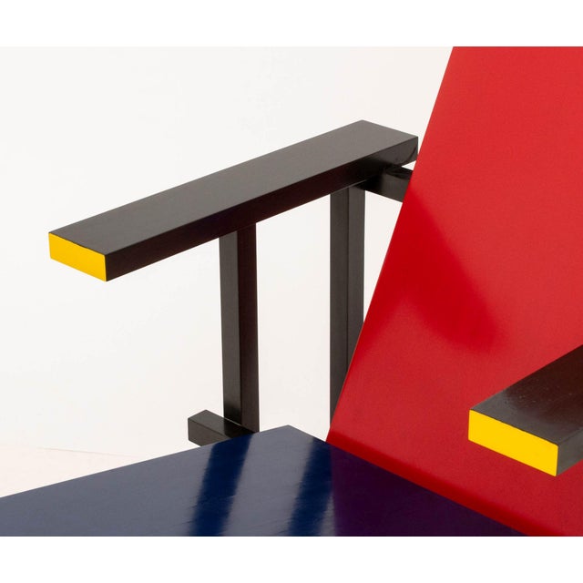 Gerrit Rietveld x Cassina "Red and Blue" Armchair, Polychrome Wood in red, blue, black and yellow, with Cassina label....
