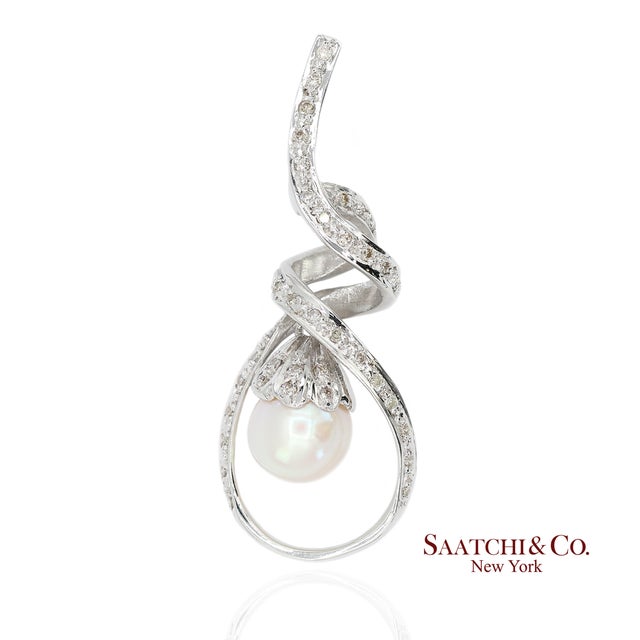 Natural Diamond and Pearl Pendant Necklace Metal Type: 18k White Gold Total Item Weight: 6.1 Grams Length: 43.0 mm Width:...
