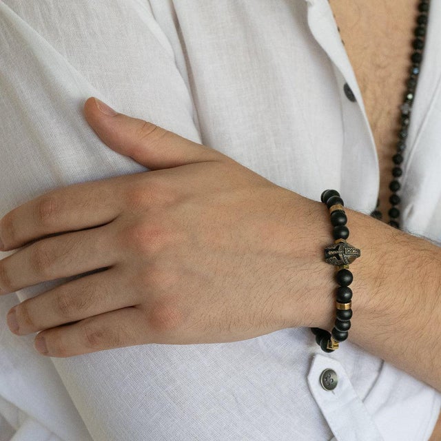 The Black Vibe Onyx Stone Beaded Gladiator Bracelet is more than just a piece of jewelry—it's a symbol of strength and...
