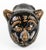 It was a porcelain pillow, molded in the shape of a crouching beast, meant to support the neck during long nights of study...