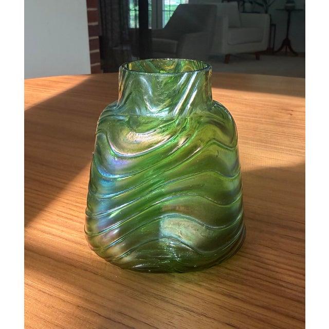 Liquid glass, captured mid-wave. This luminous hand-blown vase embodies the full drama of the Bohemian Art Nouveau...