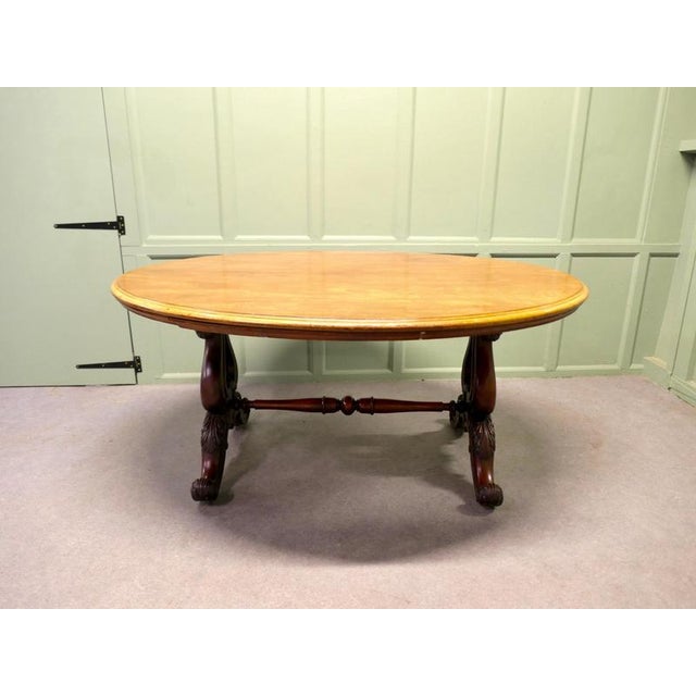 Victorian Walnut Dining or Oval Centre Table The table has a beautifully carved base with a large oval top, the top of the...
