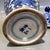 Striking Chinese blue and white lidded ginger jar, hand decorated with a mythical qilin beast amid lush peony floral...