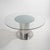 A “Cidonio” table designed by Antonia Astori for Driade in the 1970s, characterised by a large circular transparent glass...
