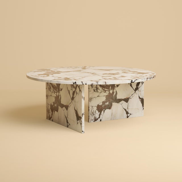 Calacatta Viola marble gives the Ishiki its register. This is a low table for the space in front of a sofa, built so that...