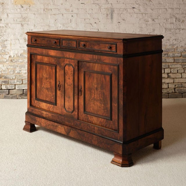 Add depth and timeless elegance to your space with this late 19th century French walnut buffet, a beautifully crafted...