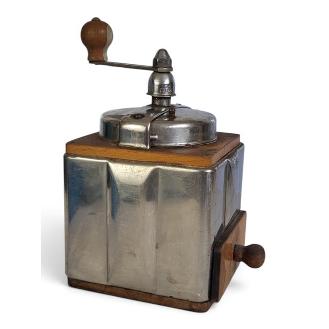 Peugeot Frères Coffee Grinder, Chrome Body, "Hidden" Model This French-made, cubic-shaped mechanical coffee grinder,...