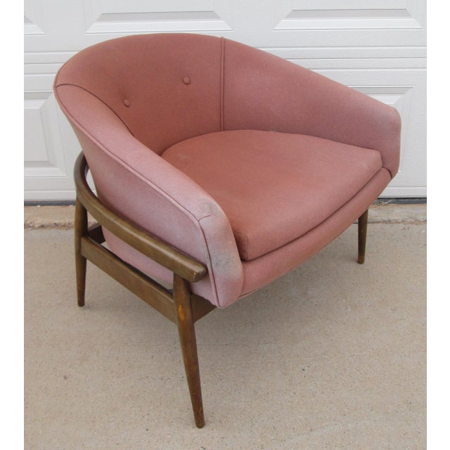 Vintage mid century modern barrel lounge chair with barrel frame. The chair does not have a maker mark or label and is in...