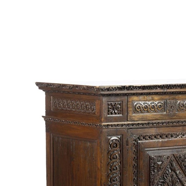 Furniture - Wardrobe - 18th Century. Portuguese, 18th century, in chestnut wood with two drawers and two doors, depicting...