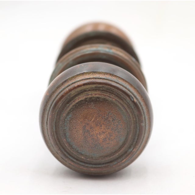 Vintage concentric passage door knob set made of bronze with a patina finish. The original mounting screws are not...
