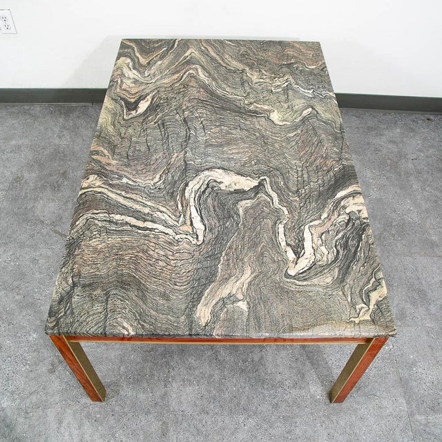 Unique and very well made coffee table recently imported from Europe. This table offers a large stone marble surface that...