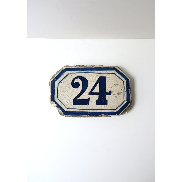 A French outdoor enamel house‑number sign plaque ‘24’, Midcentury Modern design, circa mid 20th century, France. A vintage...