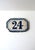 A French outdoor enamel house‑number sign plaque ‘24’, Midcentury Modern design, circa mid 20th century, France. A vintage...