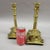 A spectacular pair of Russian solid cast brass candlesticks with decorative perforated drip trays near the base. Very...