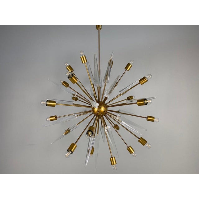 Italian-designed Stilnovo-style Sputnik chandelier, made of brass with Murano glass tips. Up to 250V (Europe/UK...