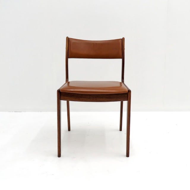 wonderful set of eight 1960s Danish dining chairs in palisander & leatherette seat and back covers.