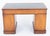 A distinguished Victorian oak pedestal desk of exceptional quality and generous proportions, presented in the desirable...