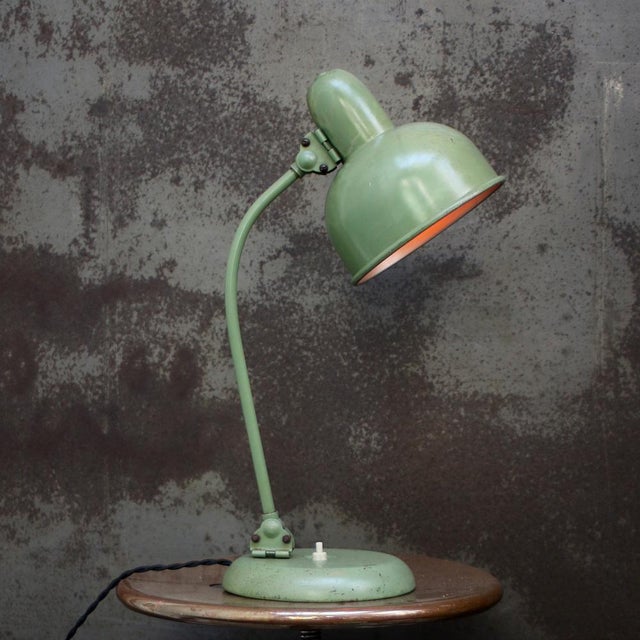 Green French Manufrance Bauhaus style metal desk lamp ca 1950 Diameter base 17 cm Black cotton wire with plug. Available...