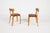 Early edition pair of chairs from Alvar Aalto, produced in 1930’s. Lacquered birch frame with new seat upholstery in...