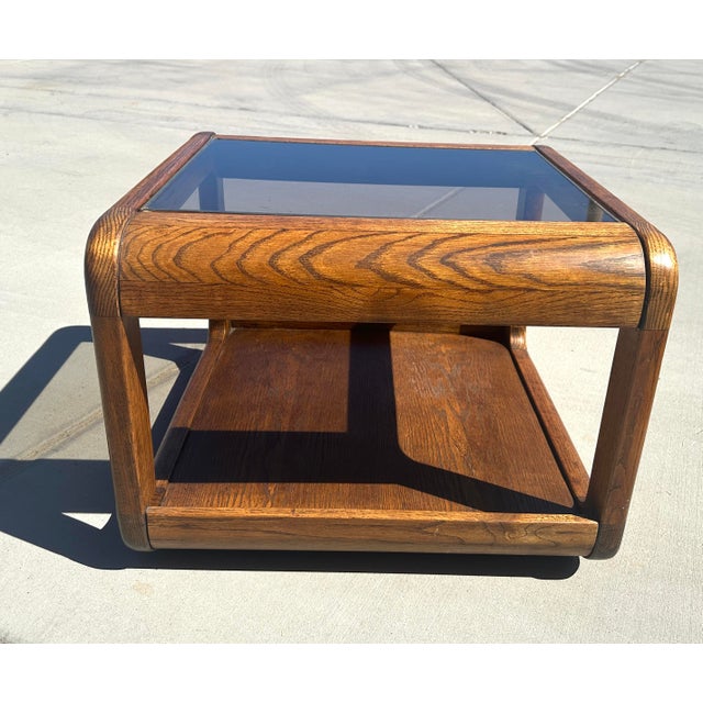Vintage Waterfall Edge Side Table. Oak with smoked glass and brass trim around the glass. Great tables for most decor's,...