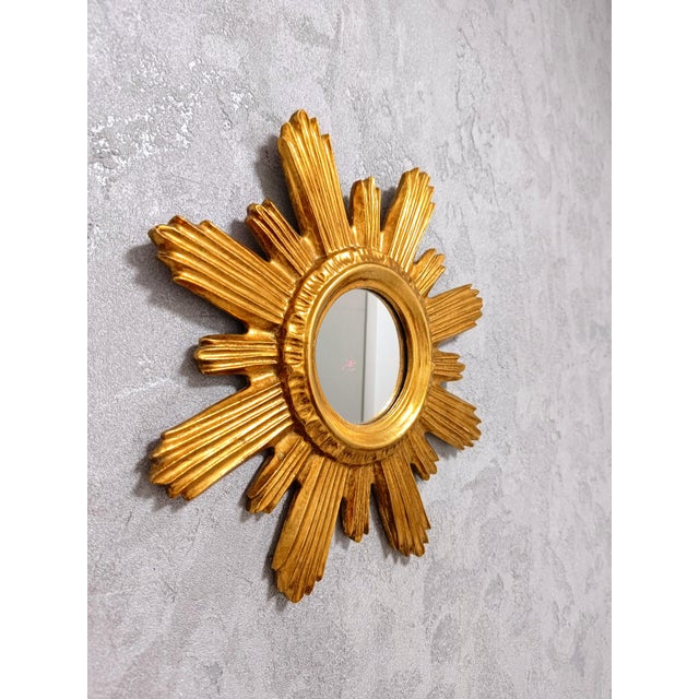 Mid-Century Modern Hollywood Regency Gilt Sunburst Wall Mirror, 1960s, in Very Good conditions. Designed 1960 to 1969