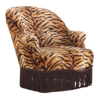 A French Lounge Chair Covered in Faux Tiger Fabric, 19th C.. For Sale