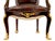 A French armchair is executed in the opulent style of Francois Linke, featuring a shaped backrest and seat upholstered in...