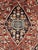 Pretty small vintage Pakistani rug with nice geometrical design in style of Tabriz rugs, and beautiful colours with orange...