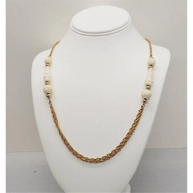 1970s Vintage 1970s Signed Crown Trifari Carved Faux-Ivory Sautoir Necklace For Sale - Image 5 of 9