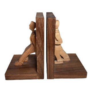 Vintage Hand-Carved Wooden “Opposing Forces” Bookends- a Pair For Sale