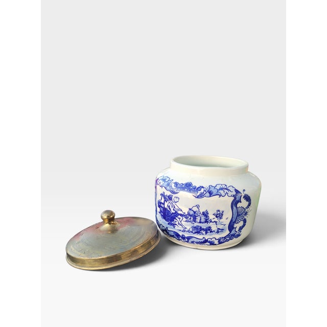 An elegant and highly decorative hand-painted Dutch Delft Blue tobacco jar and humidor, produced by Goedewaagen in Gouda,...