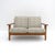 wonderful Danish two-seat sofa, model GE290/2 designed by Hans J. Wegner for GETAMA, 1950, with a solid oak frame and...