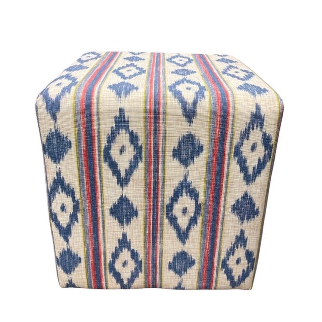 Elevate your home décor with the timeless charm of this vintage-inspired upholstered cube ottoman. Wrapped in a rich woven...