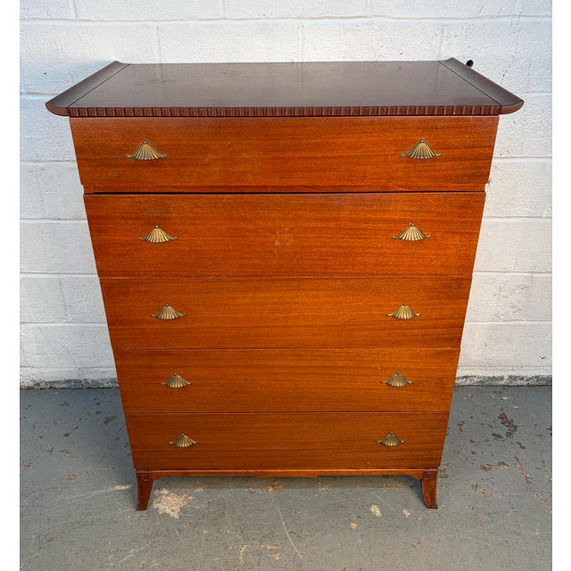 Elegant and architecturally striking, this mid-century Pagoda highboy dresser by R-Way Furniture showcases the brand’s...