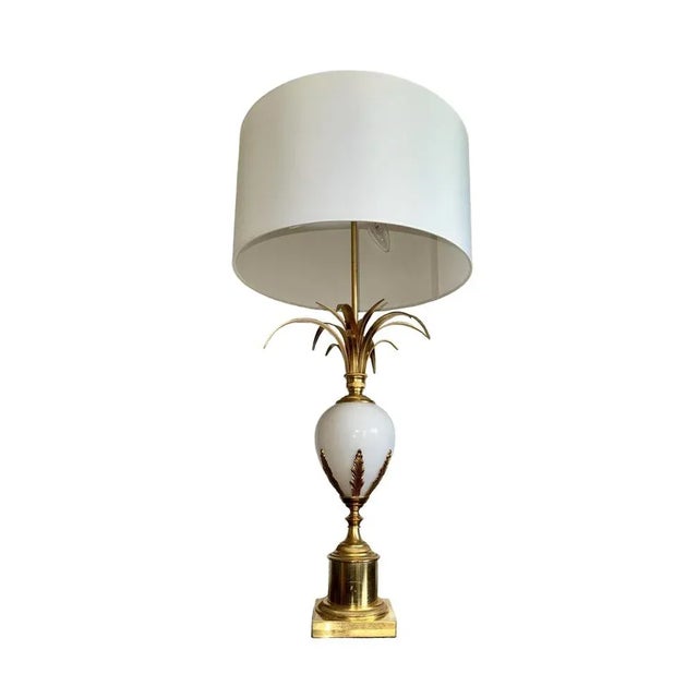 Maison Charles Hollywood Regency style high end table lamp, classic pared-down base, gold bronze and gold plated metal,...