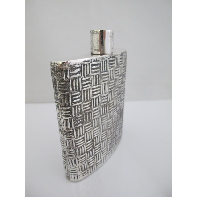 Mexican sterling silver hip flask with heavily textured basket weave design. Total weight 201.80 grams Measures 4 3/4"...