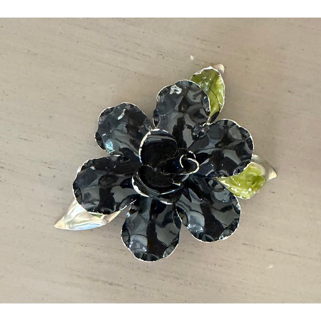 A great 1960’s black and green flower brooch. Shading appropriate to age as seen in photos…adds silver shine and character!