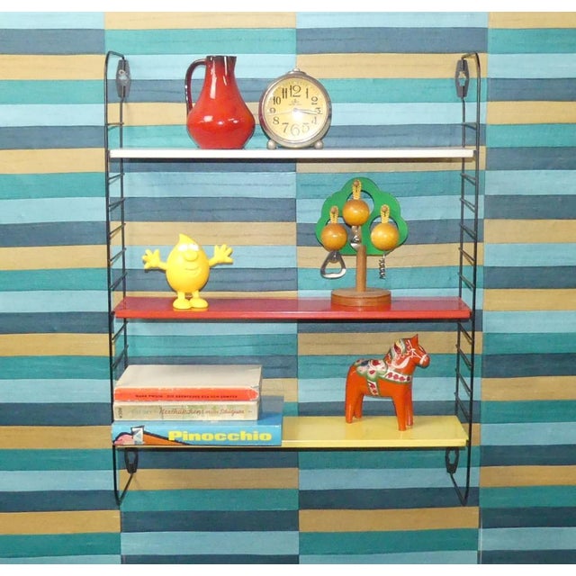 String Shelves in Red, White, Yellow and Black Ladders by A. D. Dekker for Tomado, 1960s, in Good conditions. Designed...