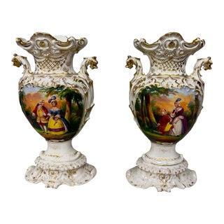 Pair of Late 19th Century Old Paris Porcelain Courting Scene & Floral Decorated Vases With Figural Lion Handles For Sale