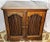 Solid teak Balinese 2 door cabinet with spindle doors, single interior shelf. High hard French polish finish, rustic and...