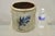 Antique Stoneware Two Gallon Crock with Cobalt Blue Slip Trailed Floral Design. Circa Mid 19th Century. Measurements: 9" H...